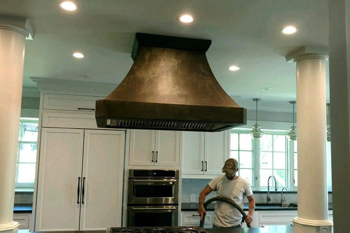An antique zinc hood, produced by Beacon Metal Fabricators.